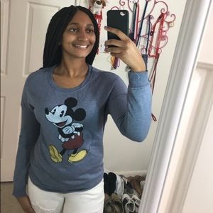 A blue long sleeve Mickey Mouse top